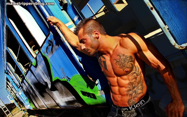 tattooed male stripper